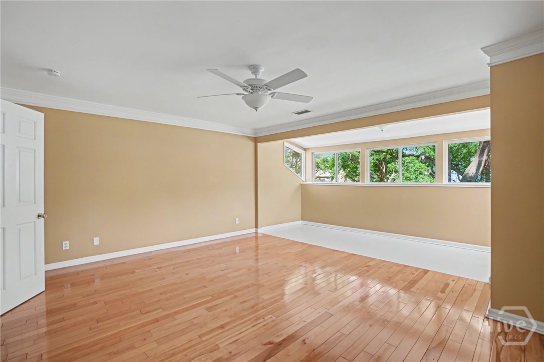 Master Bedroom overlooking beautiful grassed area and marsh/water views
