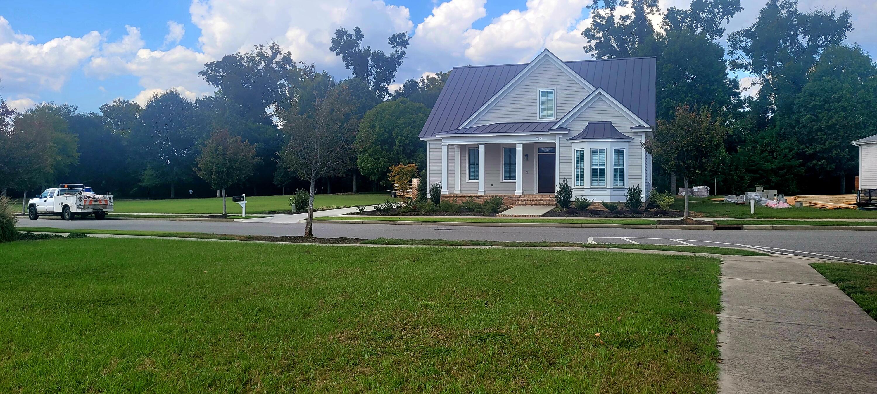 Looking at the house across the street o