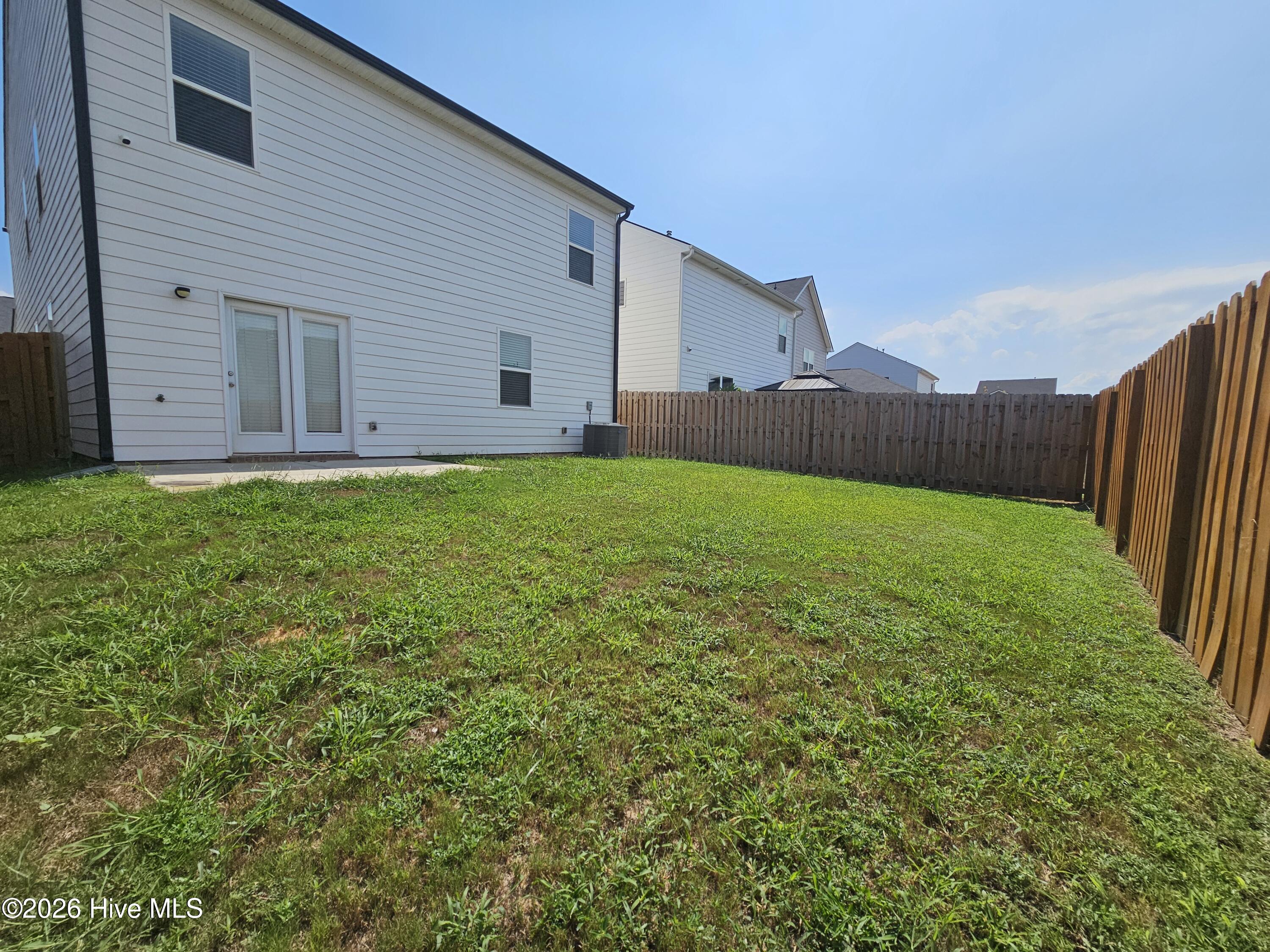 privacy fenced backyard