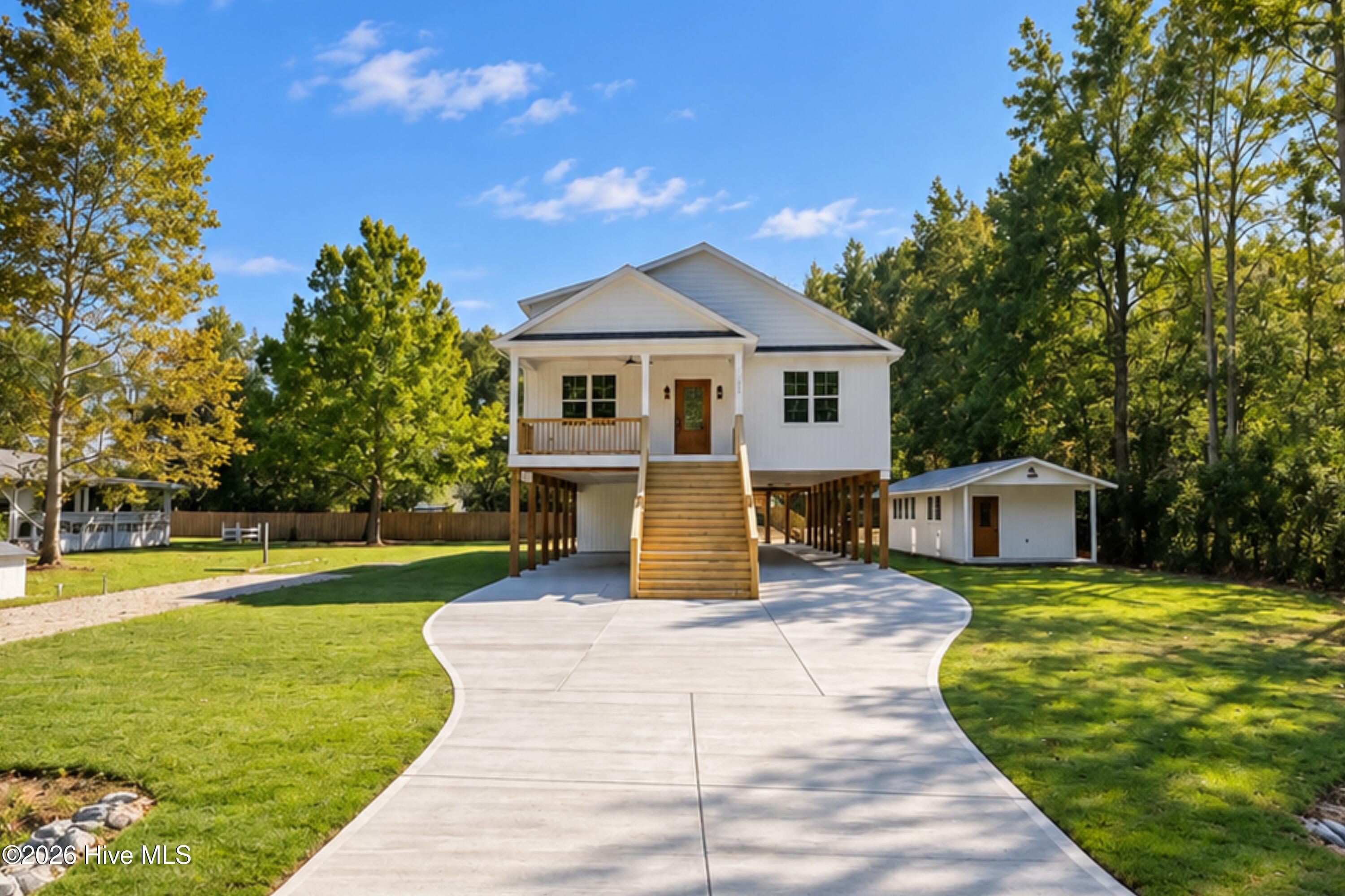 Photo 2 of Single family home for sale at 203 Sand Dollar Ln, Hampstead, NC 28443 | MLS# 100605287 | Listing updated on 2026-10-05