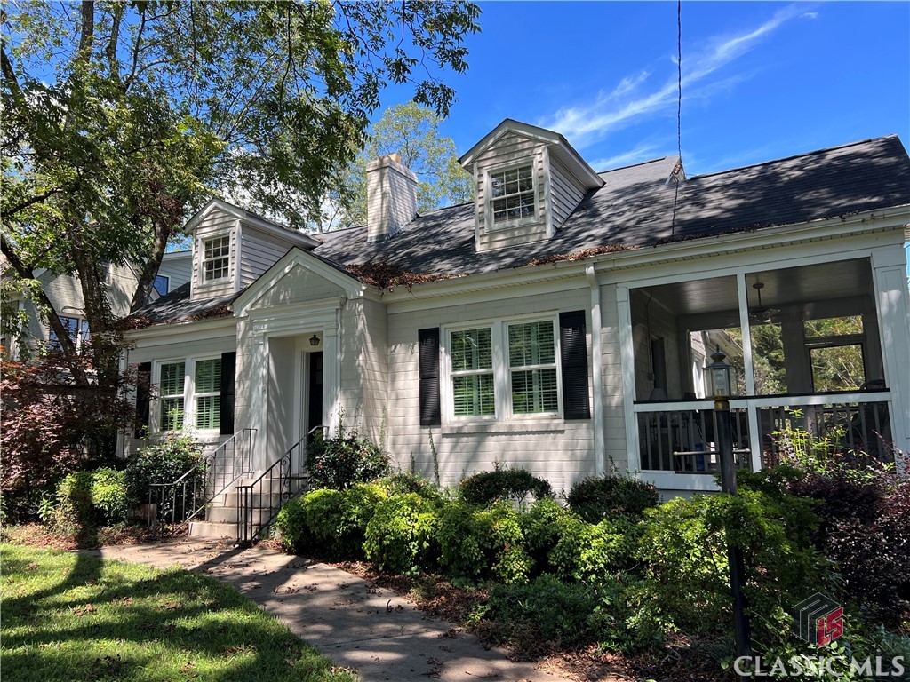 This charming Five Points cottage features 4 Bedrooms and 2 Full Baths. The owner's suite is located on the main level, as well as a secondary guest bedroom. The other two bedrooms are located upstairs along with a great flex space overlooking the rear yard. There are beautiful hardwood floors throughout the main level, 9 foot ceilings, and custom built ins in the family room which is open from the bright white, renovated kitchen!!  The Formal Dining Room, large Living Room and cozy screened porch provide ample space to relax and unwind.The lot also features a fenced in pool, great lawn and original carport!