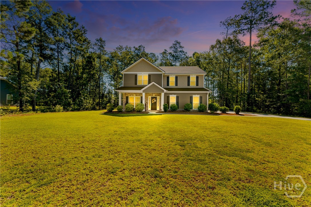 Welcome to this beautifully maintained home tucked away on a quiet cul-de-sac behind the gates of the highly desirable Ramsey Landing community. Offering a spacious, thoughtfully designed layout with stylish finishes throughout, this home perfectly blends comfort, functionality, and elegance.The modern kitchen is a standout, featuring stainless steel appliances, a walk-in pantry, and a chic backsplash that creates a striking focal point when viewed from the breakfast bar—ideal for both everyday living and entertaining.The main level includes a bedroom and full bath, perfect for guests, multi-generational living, or a home office. Upstairs, you’ll find four additional bedrooms, including a luxurious owner’s suite with a cozy sitting area and eye-catching feature wall that adds warmth and character.Step outside to the covered patio and enjoy peaceful, natural surroundings—an inviting space to relax or host gatherings year-round.Don’t miss your opportunity to own this exceptional home in one of Rincon’s most sought-after gated communities.