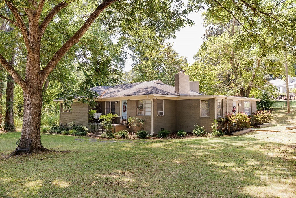 Life on South Milledge puts you close to the energy of Five Points and campus while still giving you a home with its own space to spread out. This classic one-level brick house sits on a generous approximately 0.44-acre lot, with off-street parking, a front porch for slowing down at the end of the day, and a rear deck that extends the living space outdoors.Inside, the home offers four bedrooms, two full baths, and an additional half bath across approximately 1,728 square feet. Hardwood floors, a single-level layout, and classic brick construction give the home an easy, grounded feel. The spaces are ready to enjoy now, with room for a new owner to make thoughtful updates over time.Whether you are looking for a close-in Athens address, a four-bedroom layout, or simply a home that puts Five Points, campus, and everyday conveniences within easy reach, 1620 S Milledge Avenue offers a hard-to-find combination of location, space, and potential.