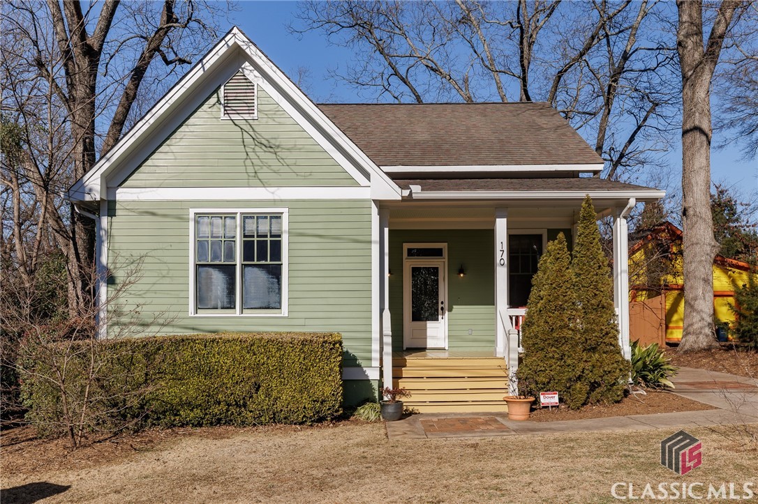 Welcome to 170 Cohen St, located in the heart of the highly sought-after historic Boulevard District. Built in 2009, this home beautifully combines modern convenience with an exterior that blends perfectly with the timeless character of the neighborhood.This stunning property features four bedrooms and two-and-a-half bathrooms, thoughtfully laid out in a smart, efficient floorplan. Step inside, and you'll immediately notice the reclaimed hardwoods throughout the main level, setting the tone for the home’s unique charm. The cozy flex room at the front of the house offers many possibilities—whether you need a home office, sitting room, or a tranquil transition space.The main bedroom is conveniently located on the first floor and includes a spacious ensuite bathroom with a jetted tub and a large walk-in closet. Down the hall, you’ll find a half bath and coat closet leading to the great room. This open-concept living space features a gas fireplace with built-in cabinetry and picturesque views of the backyard. The chef’s kitchen is designed with functionality at hand and features a large island, a spacious walk-in pantry, and a bonus butler’s pantry. From the kitchen and living room, step out onto the expansive back deck and enjoy the private, fully fenced backyard. A newly added fire pit area and its circular design seamlessly connect to a flagstone pathway, while a charming shed (built in 2024) adds even more functionality.Upstairs, you’ll find a versatile landing space perfect for a small desk or reading nook. Three generously sized bedrooms, a stylish full bathroom with classic penny tile, and a convenient laundry room complete the second floor.The current owners have lovingly maintained this home, making thoughtful upgrades during their ownership such as adding a new tankless water heater, new gutters, new window screens, new dishwasher and refrigerator, and a reimagined hardscaped backyard.Tucked away on one of Boulevard’s most peaceful, dead-end streets with no through traffic, this home offers a quiet retreat. Plus, its ideal location is just steps from award-winning Chase Street Elementary, the vibrant Prince Ave corridor with its eclectic mix of dining and entertainment, Piedmont Medical Center, and UGA’s soon-to-open Medical School at the Health Sciences Campus.Don’t miss your chance to own this truly special property! Schedule your private showing today and experience all that 170 Cohen St has to offer.