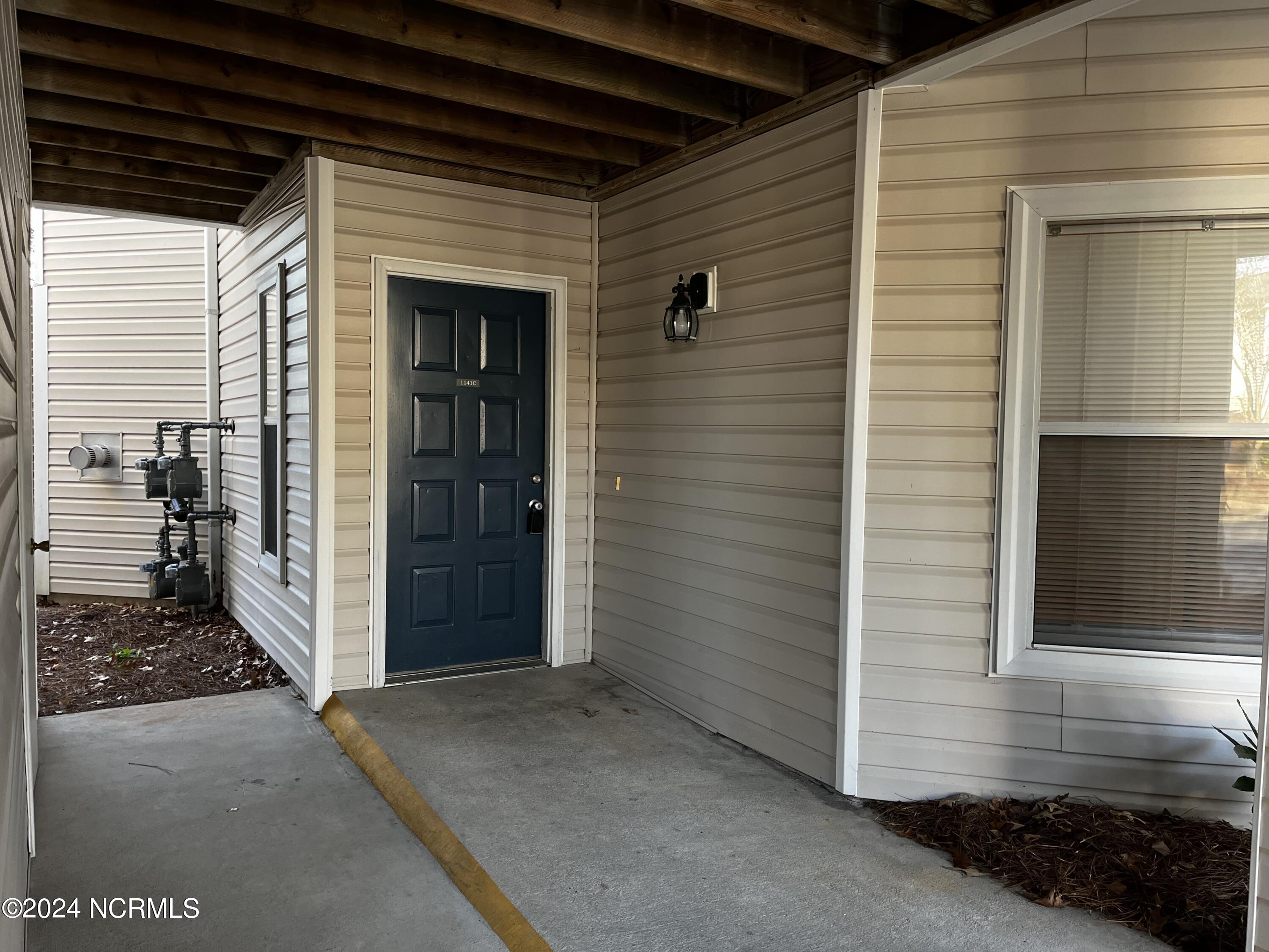 Exterior photo of 1141 Turtle Creek Road C, Greenville, NC 27858. MLS: 100592588