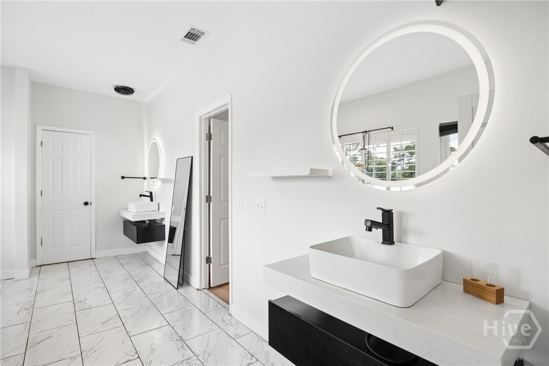 Double vanity, providing the pleasure of having your own sink. Who says you need to share?