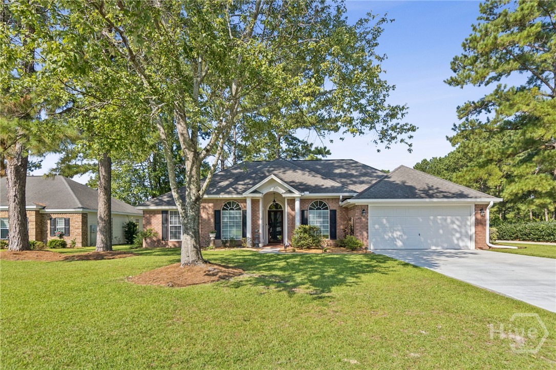 Experience the ultimate lifestyle for the golf enthusiast in this meticulously maintained ranch home, perfectly positioned on the 15th hole of the Lost Plantation Golf Course. Wake up to serene water views and the manicured beauty of the fairway right in your backyard. This spacious 4 bedroom, 2 bath single story home offers 1841 sq ft of comfort and charm. Step inside to a bright family room featuring a wood burning fireplace and vaulted ceilings, with a beautiful view of golf course, creating a welcoming gathering space. A separate dining room with wainscoting makes entertaining easy, while the split floor plan provides privacy for the owner's suite. Beautiful upgraded kitchen with granite, white cabinets and stainless steel appliance package. Outdoor living is a true highlight of the property! After a round of golf, enjoy the trex deck and covered pergola, ideal for relaxing evenings, or gather around the large circular fire pit on the paver patio, the perfect 19th hole. Additional features include a brand new driveway, thoughtful upgrades throughout, and a peaceful setting with golf course and water views.  The community offers swimming pools, tennis and a convenient restaurant and golf course. This home is ready to move in, do not miss the opportunity to make this beautiful home yours.