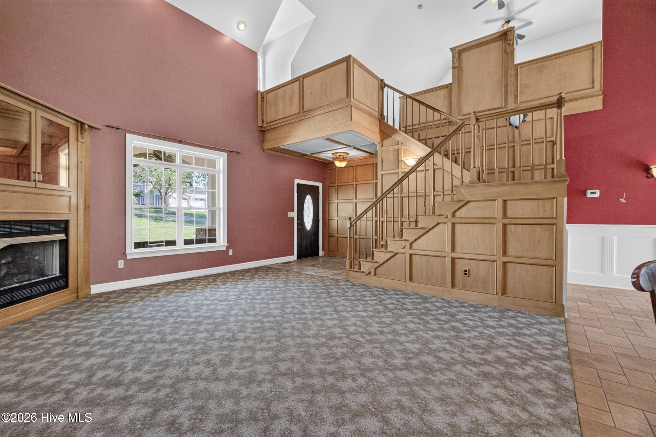 Decorative stairway & wood overhand balcony