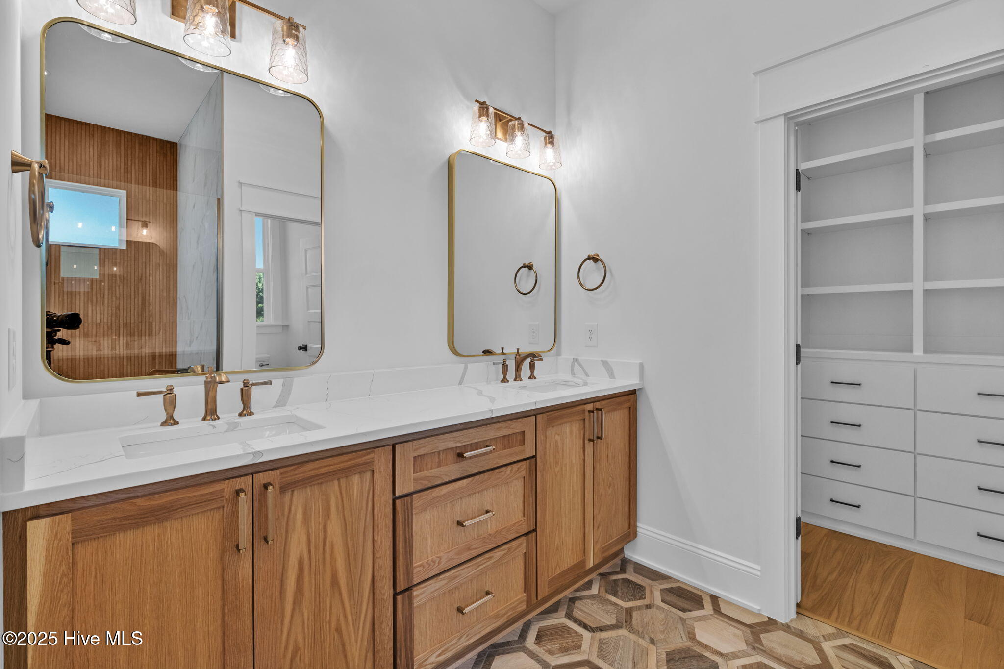 Double vanity with custom tile and fixtues