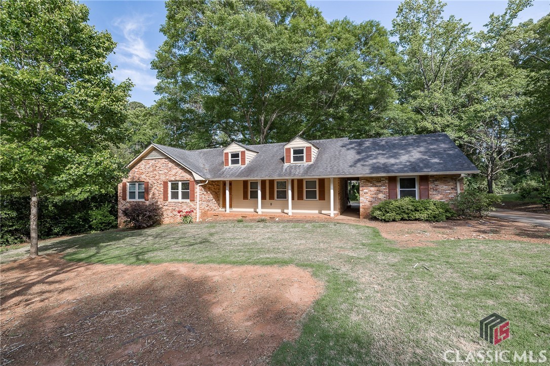 SOLD BEFORE PUBLISHED. Completely remodeled four sides brick ranch in Timothy Estates. The original living room was converted into a spacious owner's suite with ensuite bathroom. Designer touches such as Terrazzo tiled shower, barn doors, and more. Oak hardwood flooring runs throughout the entire home. Open floor plan features wide galley kitchen with Quartz countertops and tons of cabinetry. Huge windows in the living area overlook the backyard. Each bedroom has its own bathroom - all remodeled. Unfinished basement is perfect for a workshop and storage. Increase the livable space of this home by finishing the HUGE attic space - perfect for a second owner's suite, home office, or bonus room.