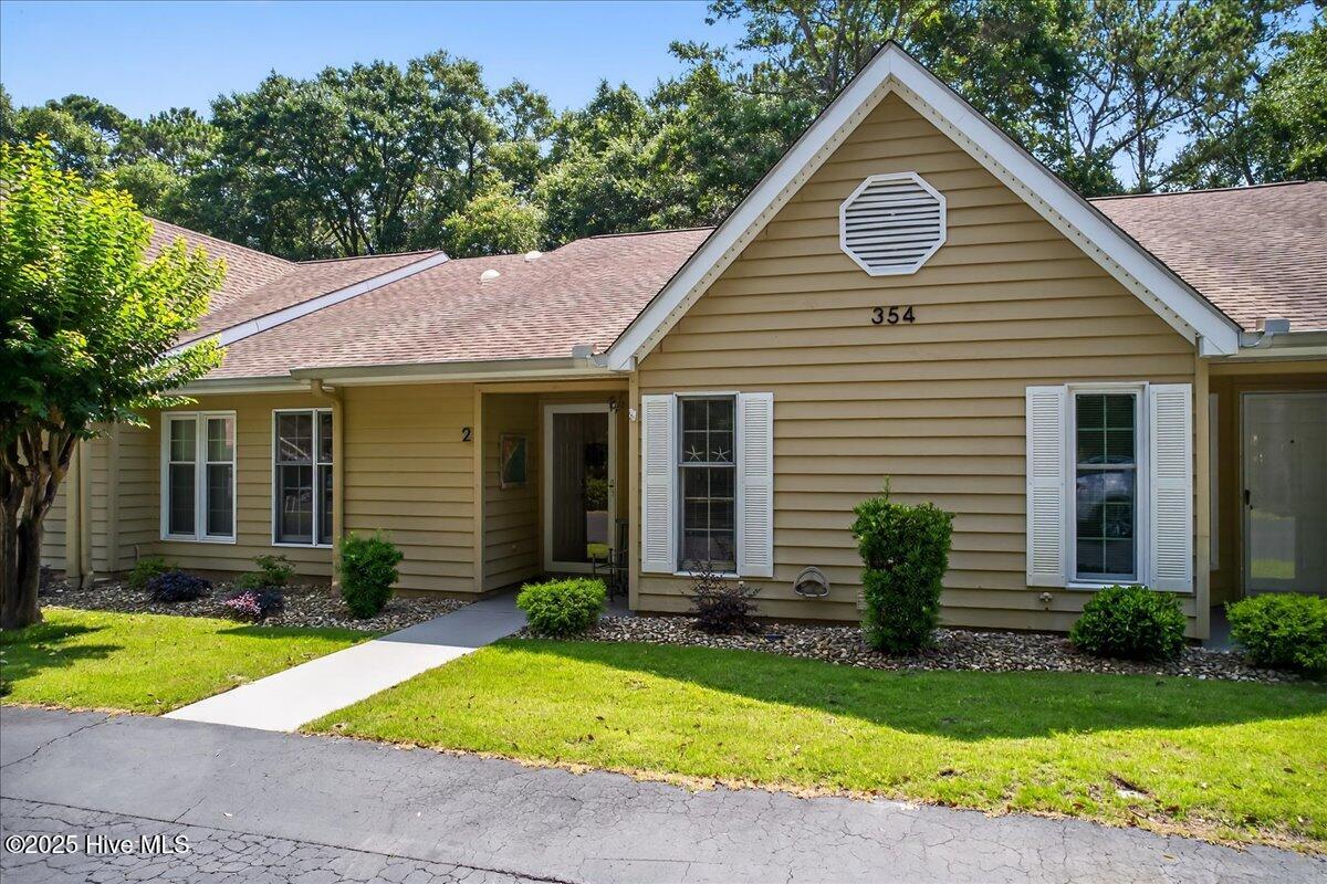 354 Sea Trail Drive E 2, Sunset Beach, NC 28468 – photo 2: 49-https---www.kahunaphoto.com--49