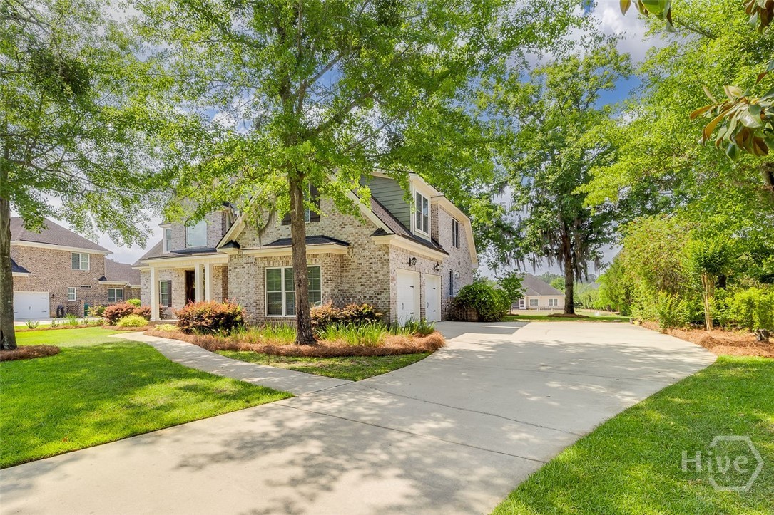 Extra long driveway and double car garage