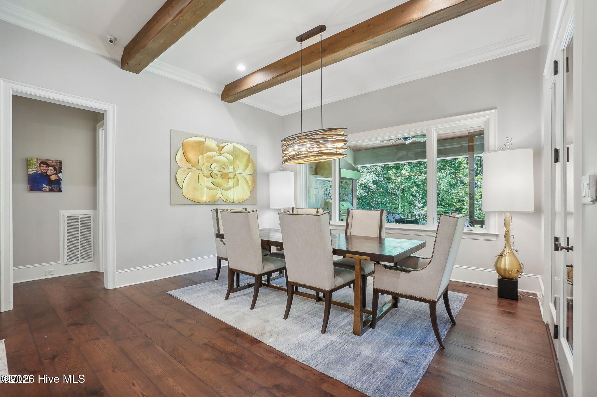 Breakfast room with wood beam ceilings