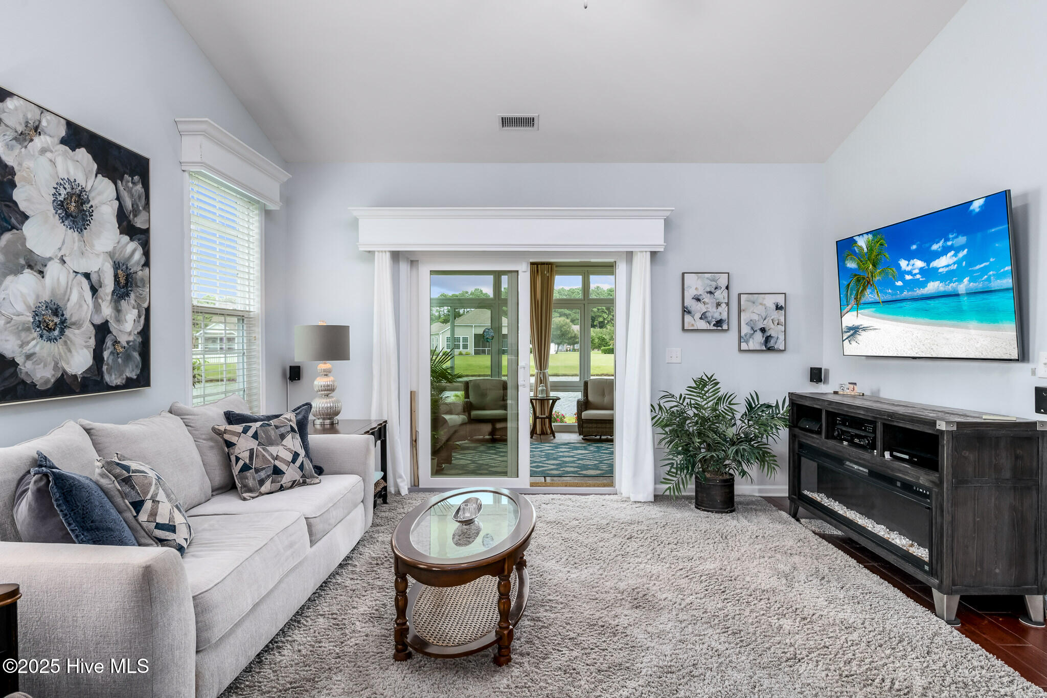 1010 Cypress Springs Court, Calabash, NC 28467 – photo 11: Living Room to Sun Porch