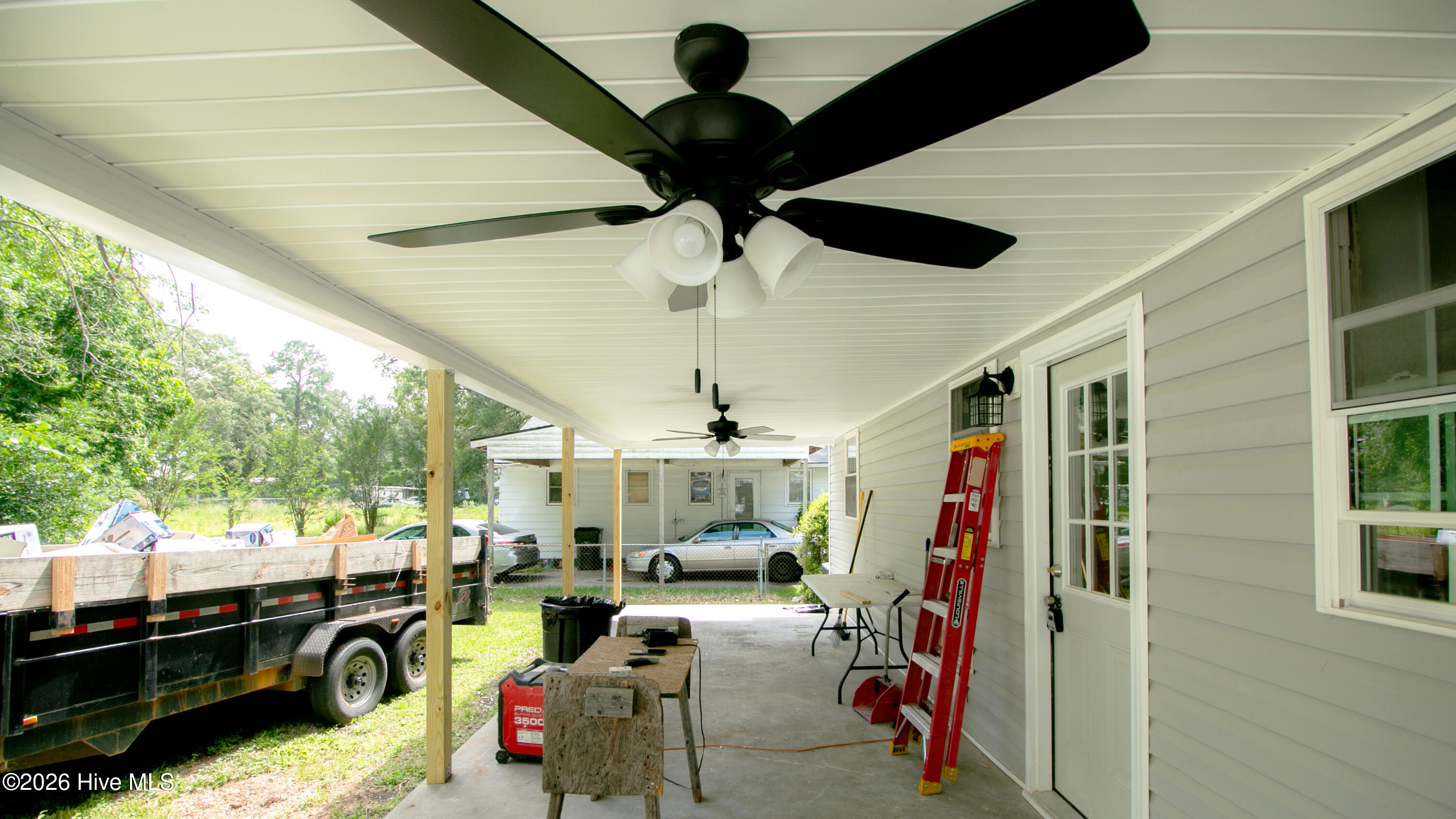 New ceiling fans added back porch