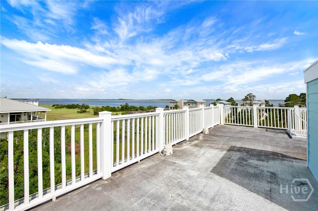Roof top deck offers panoramic water views.