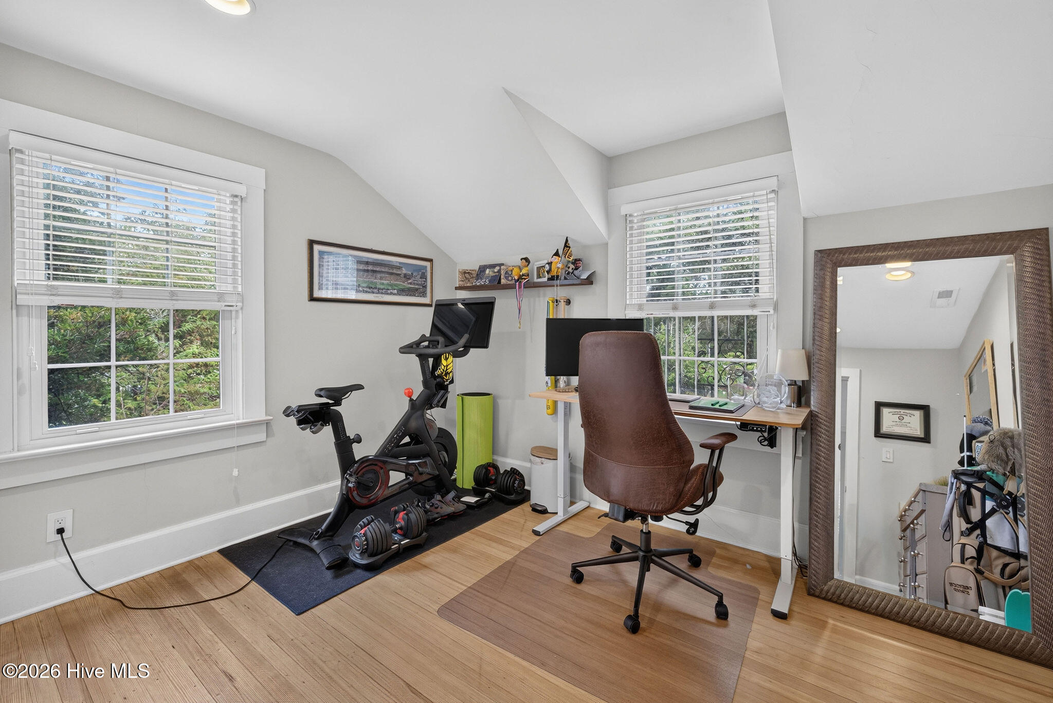 Bedroom 3 used as home office and workout room with lots of natural lighting