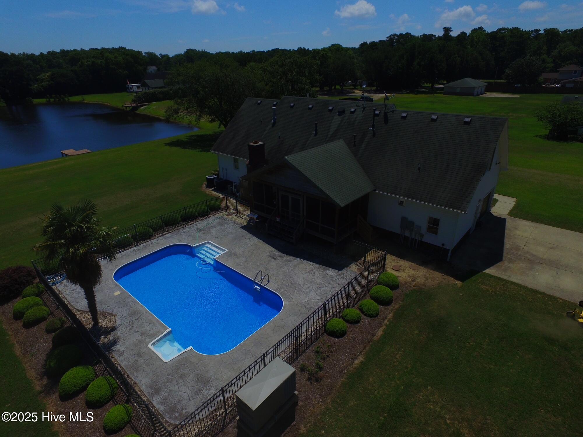 104 Perry's Way droneshot of house and p