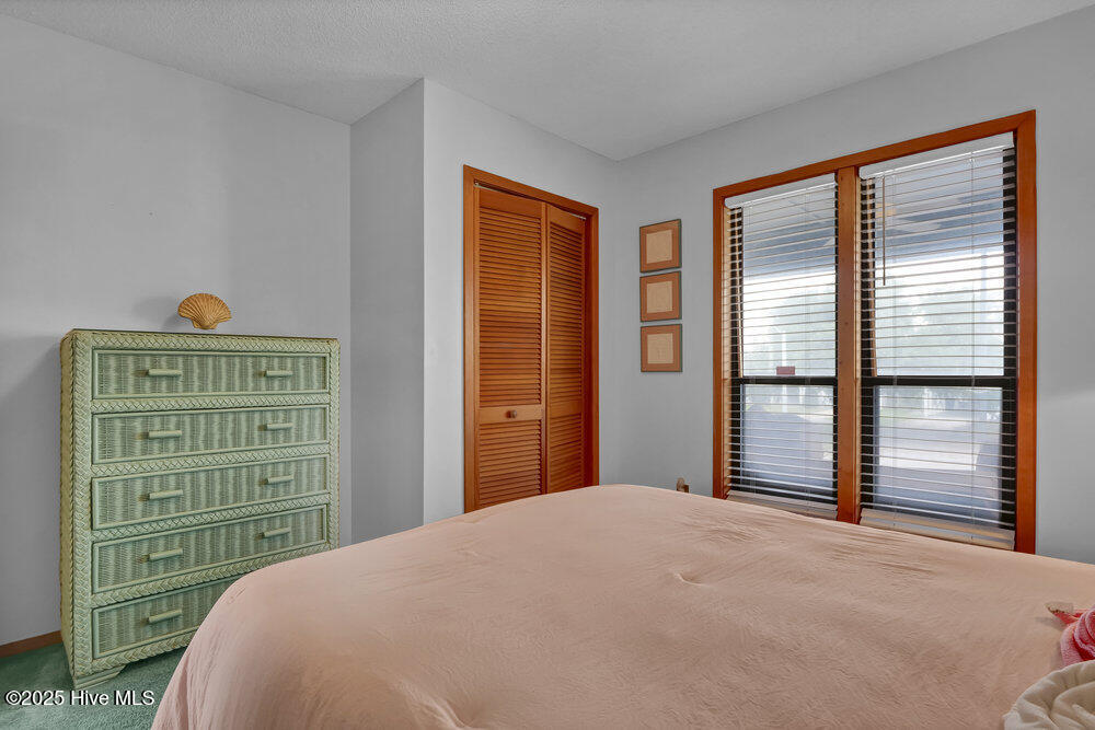 308 N Shore Drive E, Sunset Beach, NC 28468 – photo 17: Primary Bedroom