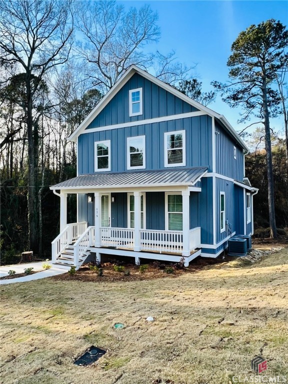 In-town, New ( under construction ) 3 level, 4/3.5 home, which includes a 784' basement apartment, built by award-winning builder, J W York Homes. The Main floor is open common living area, including a stylish kitchen featuring: an Island with pendant lighting, white quartz counters, tile backsplash, stainless appliances & range hood, and a pantry. Upstairs has 3 bedrooms, 2 baths, including a master suite; the master bath features a tile shower, granite counters on vanity, and satin bronze light fixtures. The basement has an additional, 4th bedroom, bath, another common living area, and kitchenette, which can flexibly function for an array of possible needs: an in-law, guest, or teen suite, rental income, a home office, workout/gym space, home theater, possibly a Maan or human cave. This lovely home sits on a sloping lot, with a creek crossing the left rear, overlooking acres of woods behind the property. Of note, its 1 block from the Firefly Trail, a newly created bike/walk path which can take one through Dudley Park ( 3 blocks away ), across the Oconee River, and straight into Downtown; this trail continues to be expanded, and ties into the labyrinth of evolving Greenway Trails. This property is also within close proximity of UGA's historic North campus, a diverse array of restaurants, live music/entertainment, and most all the things which make Athens a desirable destination.