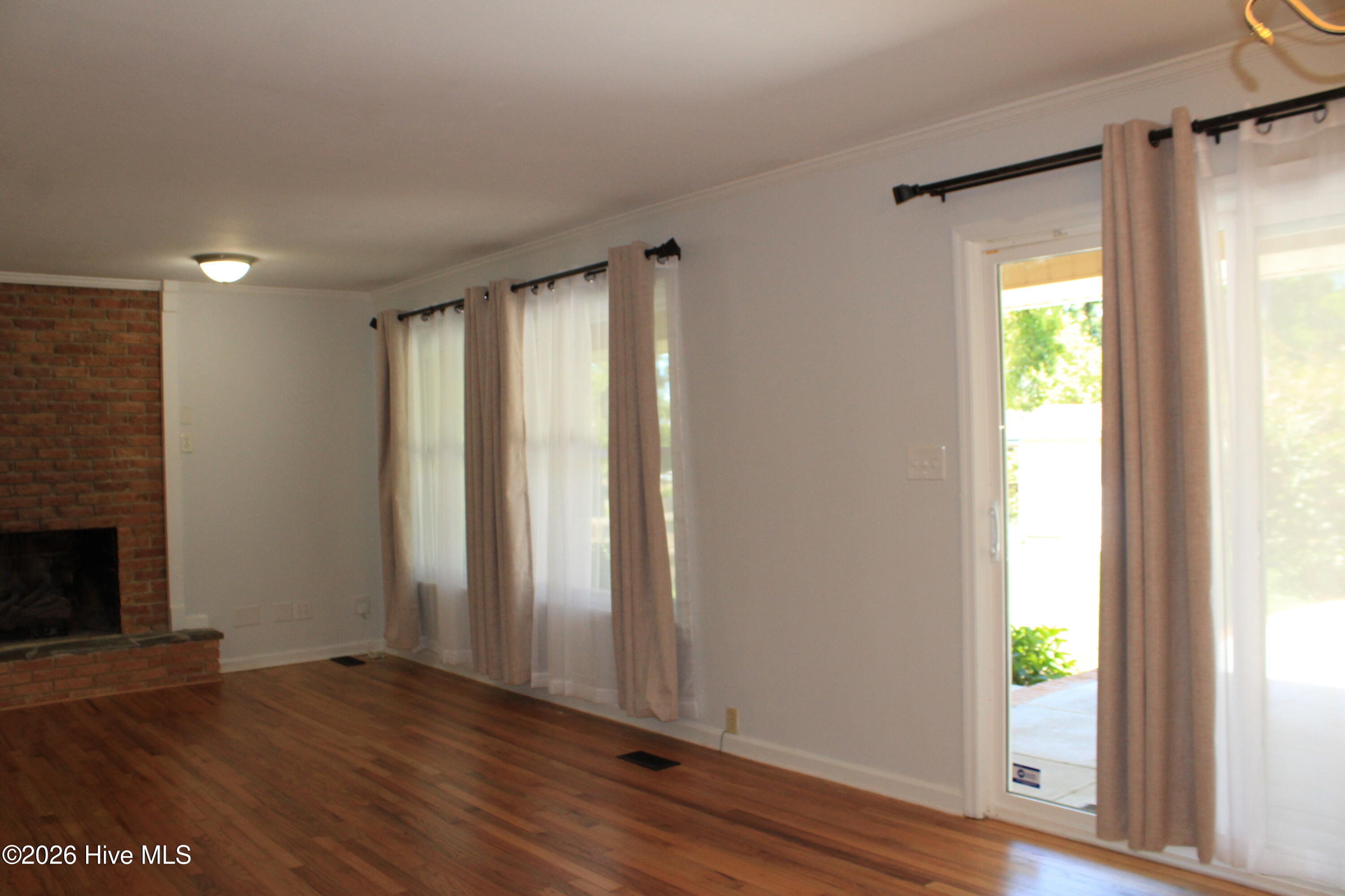 Double glassed door w/ patio access.