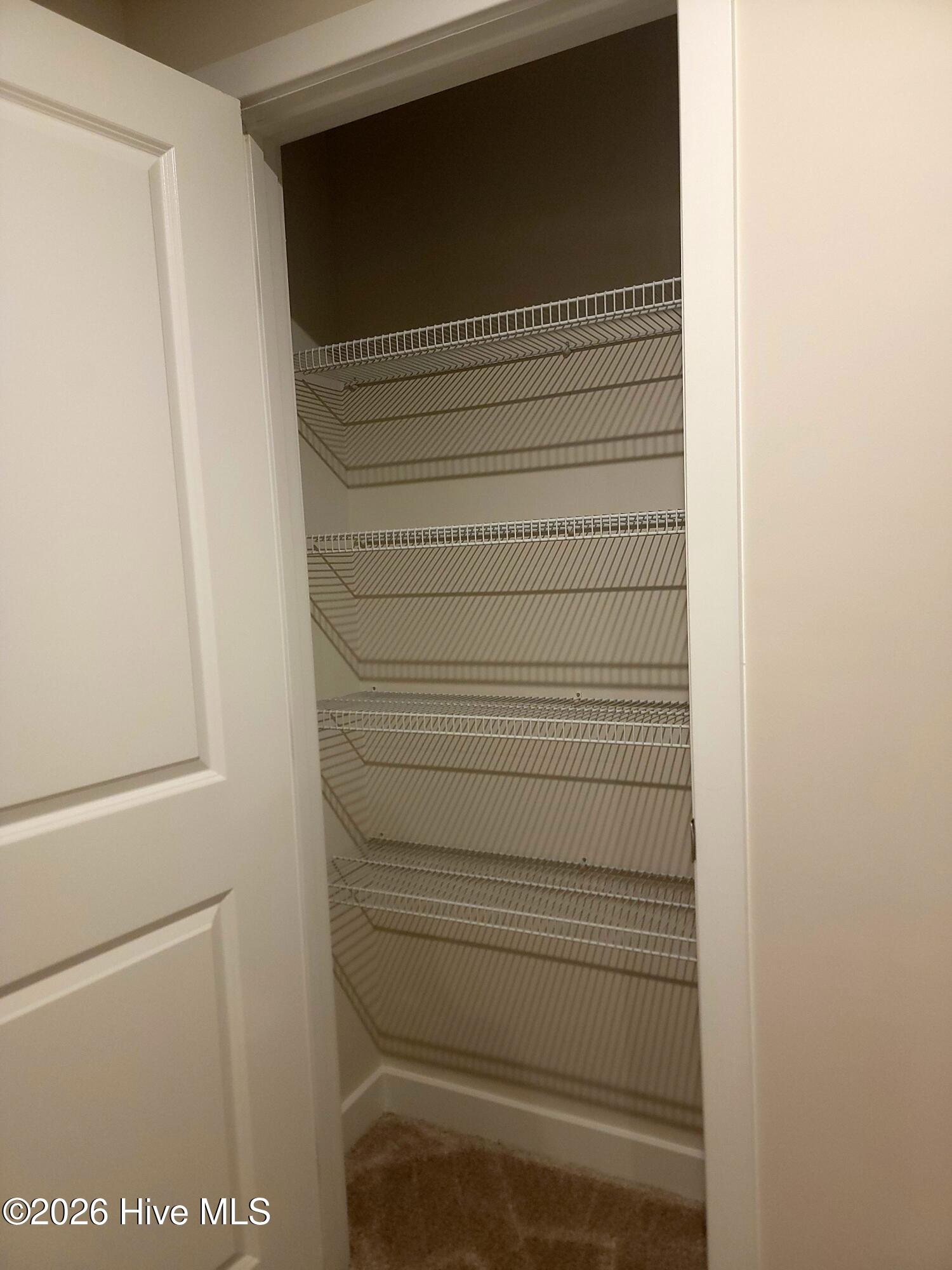 More storage space, a linen closet on the upstairs landing next to the bathroom.