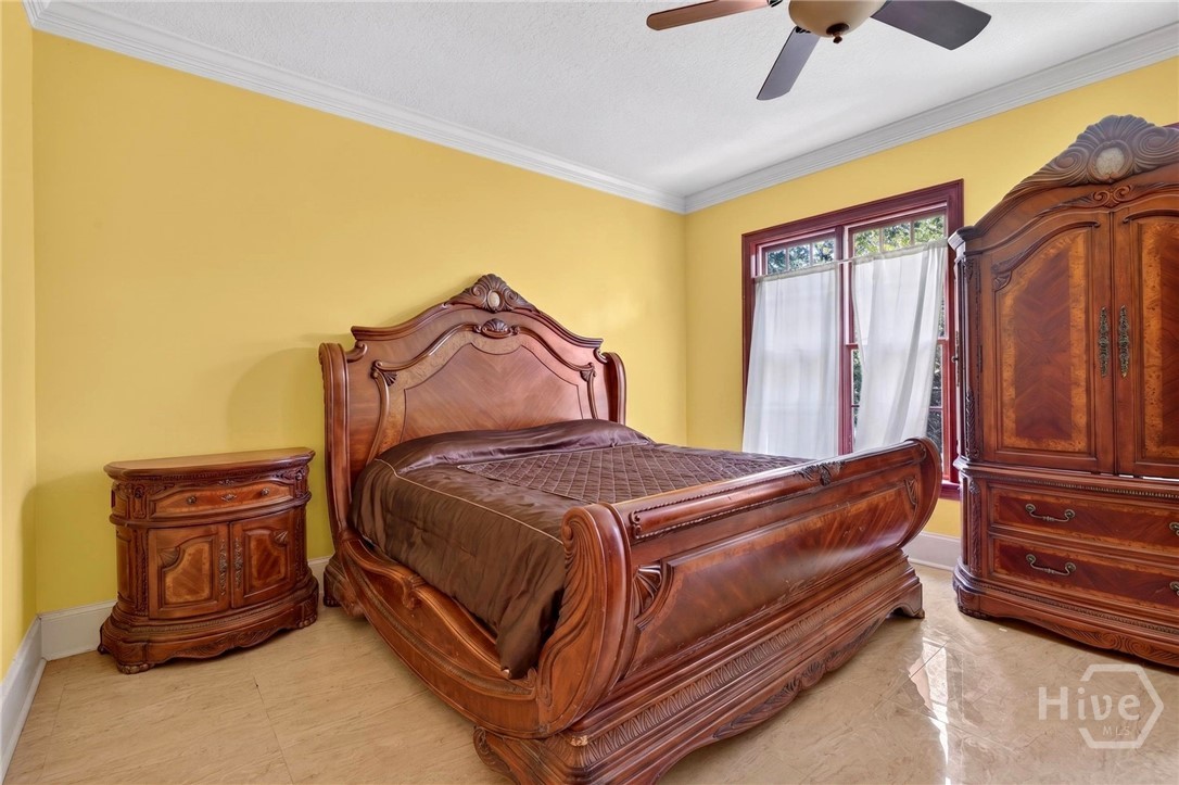 1st floor bedroom (could be 2nd owner's suite) Virtually decluttered. Ensuite bath out of frame on left
