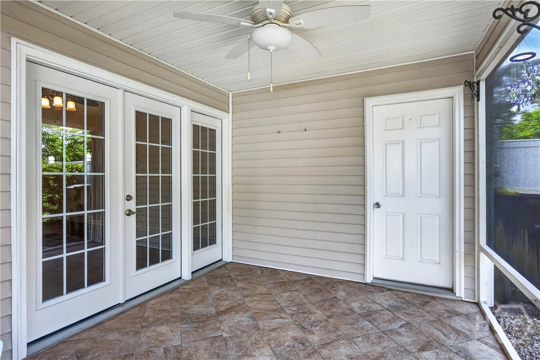 With your back to the porch screened door - storage room closet door on the right