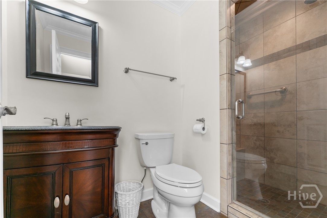 Guest bath with beautiful tile shower and vanity