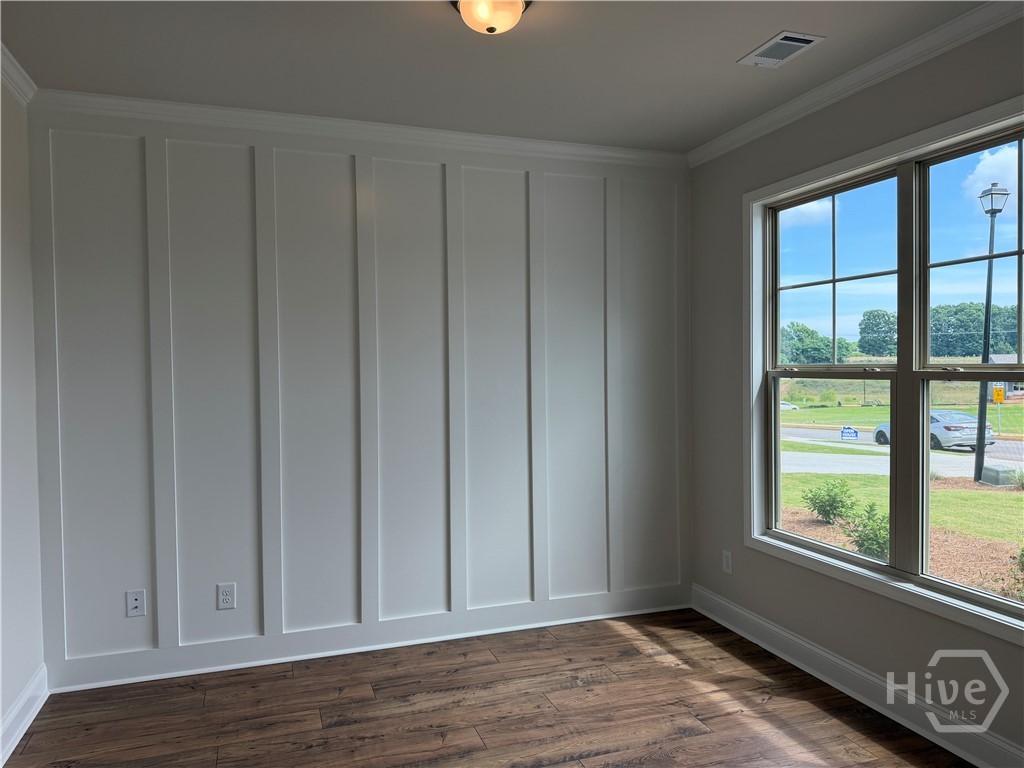 Separate flex room with board & batten accent  wal