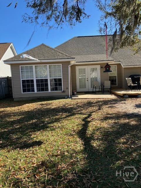 Back side of house with patio