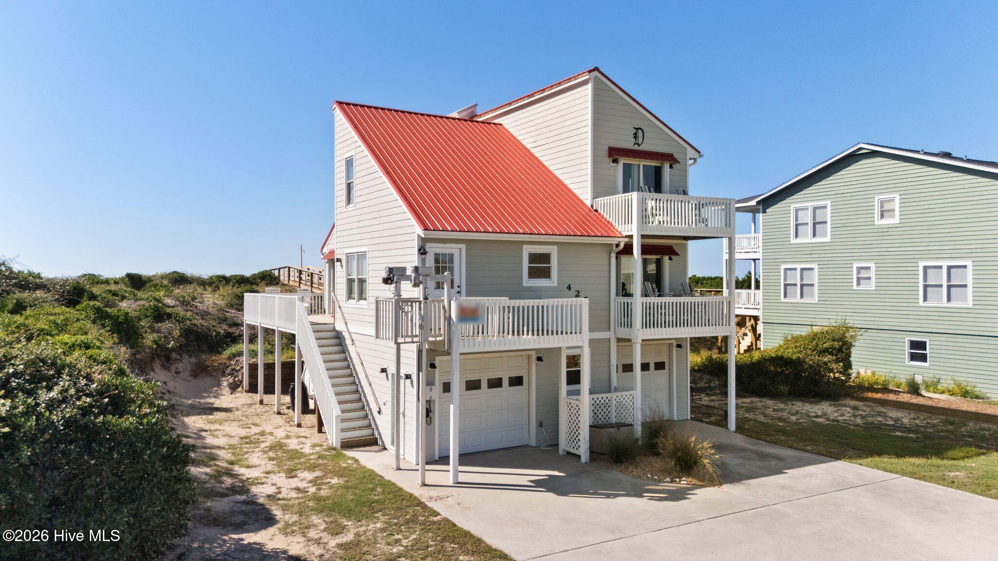 Photo 3 of Single family home for sale at 425 Caswell Beach Rd, Oak Island, NC 28465 | MLS# 100611200 | Listing updated on 2026-10-21