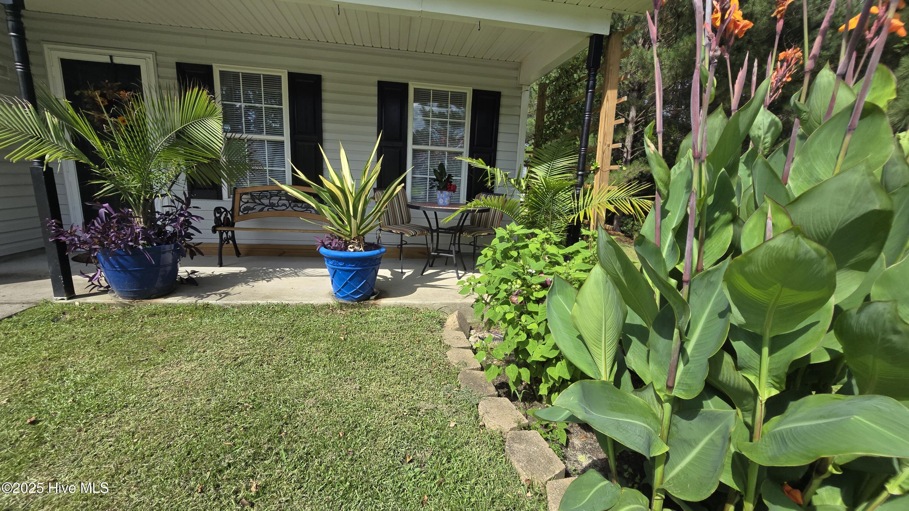 108 Willowbend Drive, Burgaw, NC 28425 – photo 6: Lush Floral Garden