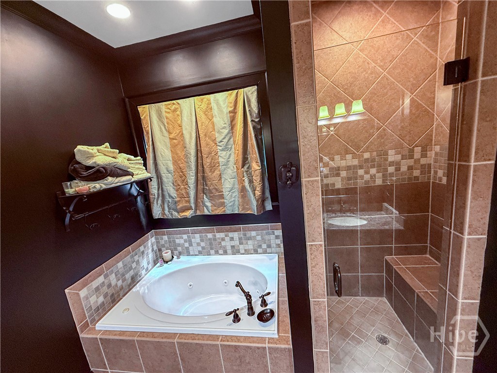 Master Bathroom separate Jacuzzi Tub and Tiled Shower
