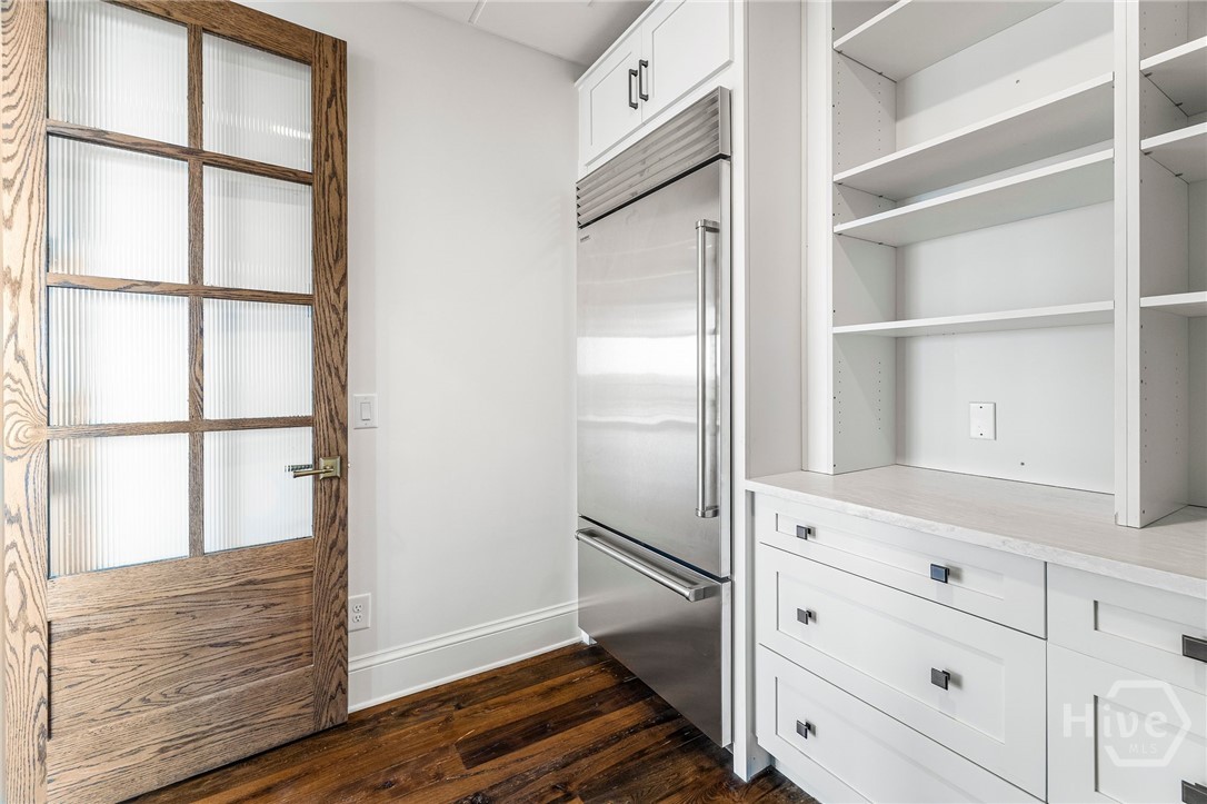 Hidden walk in pantry.