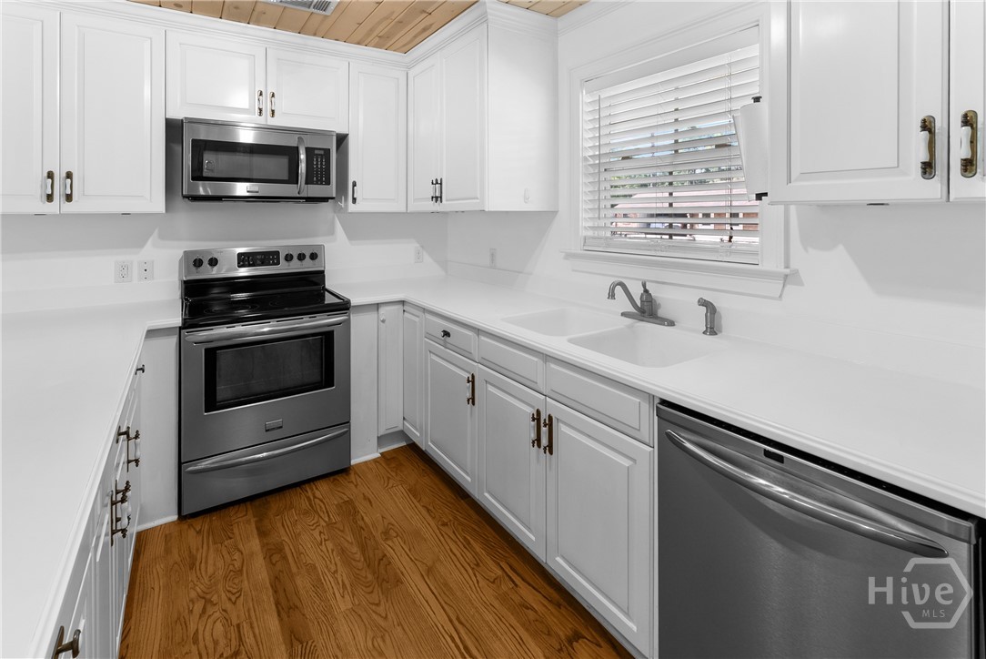 Light and airy kitchen opens to family room