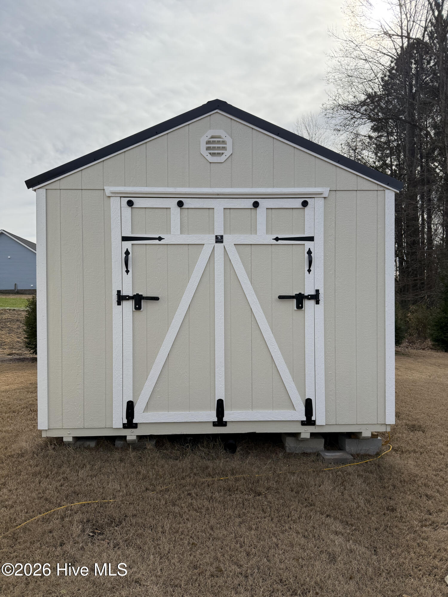 This door pulls down to a ramp for loading mowers, golf carts,etc.