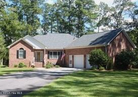 Stunning waterfront 3 bedroom 2.5 bath brick home with deep water access sitting on the shore of beautiful Ball Creek. This home boasts vaulted ceilings in the great room, kitchen and dining room. Master ensuite with great water view and a huge walk in closet.  Master bath has a jacuzzi tub and walk in shower. The spacious kitchen has granite counters, stainless appliances, an island in the middle, and opens to the waterfront breakfast nook. Oversized 2 car garage with a finished room above is perfect for an office, workout, or hobby room. Expansive walk-in attic storage. Waterfront deck and screened porch are perfect places to relax with a morning cup of coffee, reading a book or entertaining friends and family. Pop in the vinyl panels when the temps go down to use the porch year round. Yard is a gardeners dream to grow flowers, vegetables and fruit. A lot of thought went into the building of this lovely home. Minutes to the Bay River, ICW, and Pamlico Sound. Bring your water toys and explore all our beautiful creeks, rivers, and sounds!