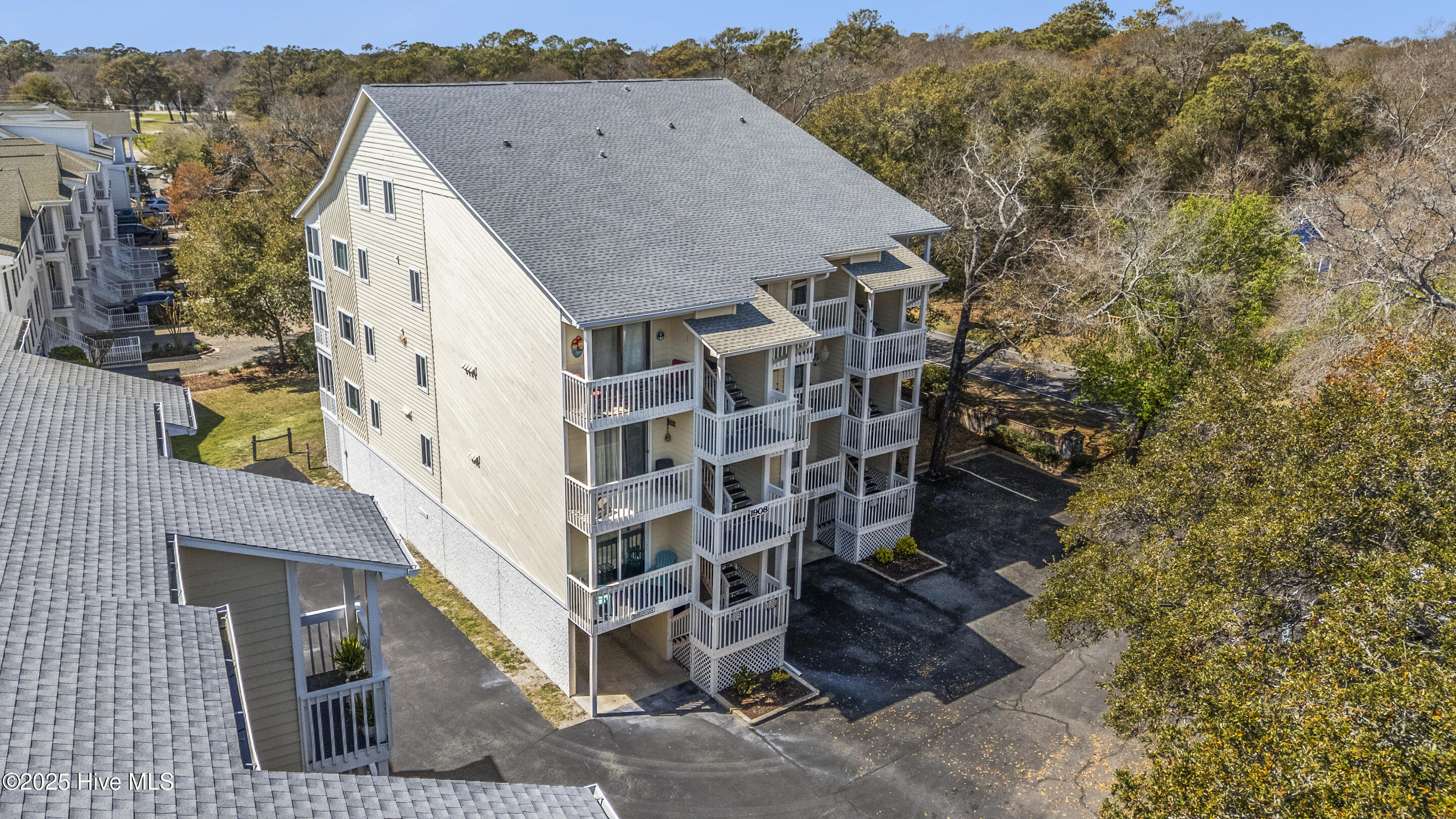 1908 Goose Creek Road SW Unit 1202, Ocean Isle Beach, NC 28469 – photo 5: Roof 2023