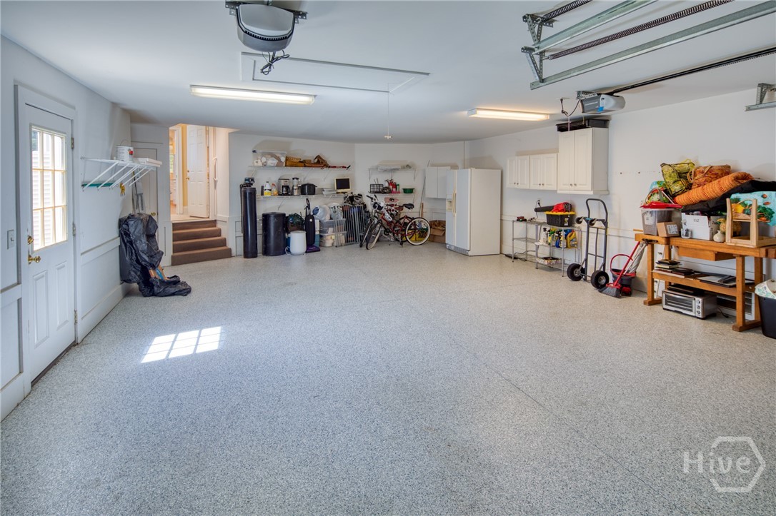 large two car garage with room for 1-2 golf carts