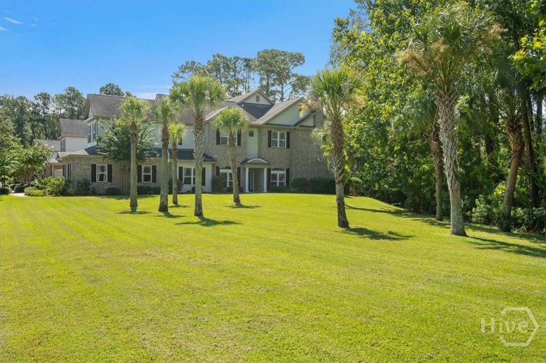 Corner unit lending access to private side yard. E