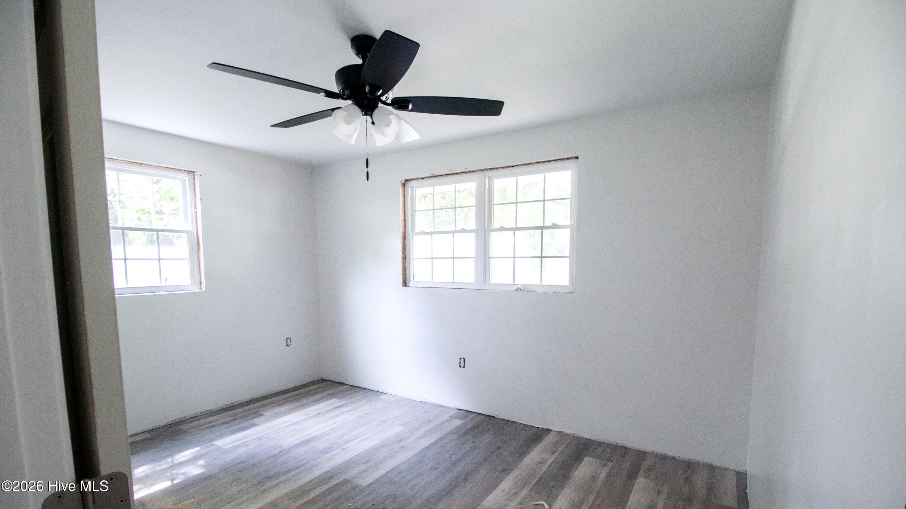 Bedroom floors added and ceiling fans-trim work coming soon