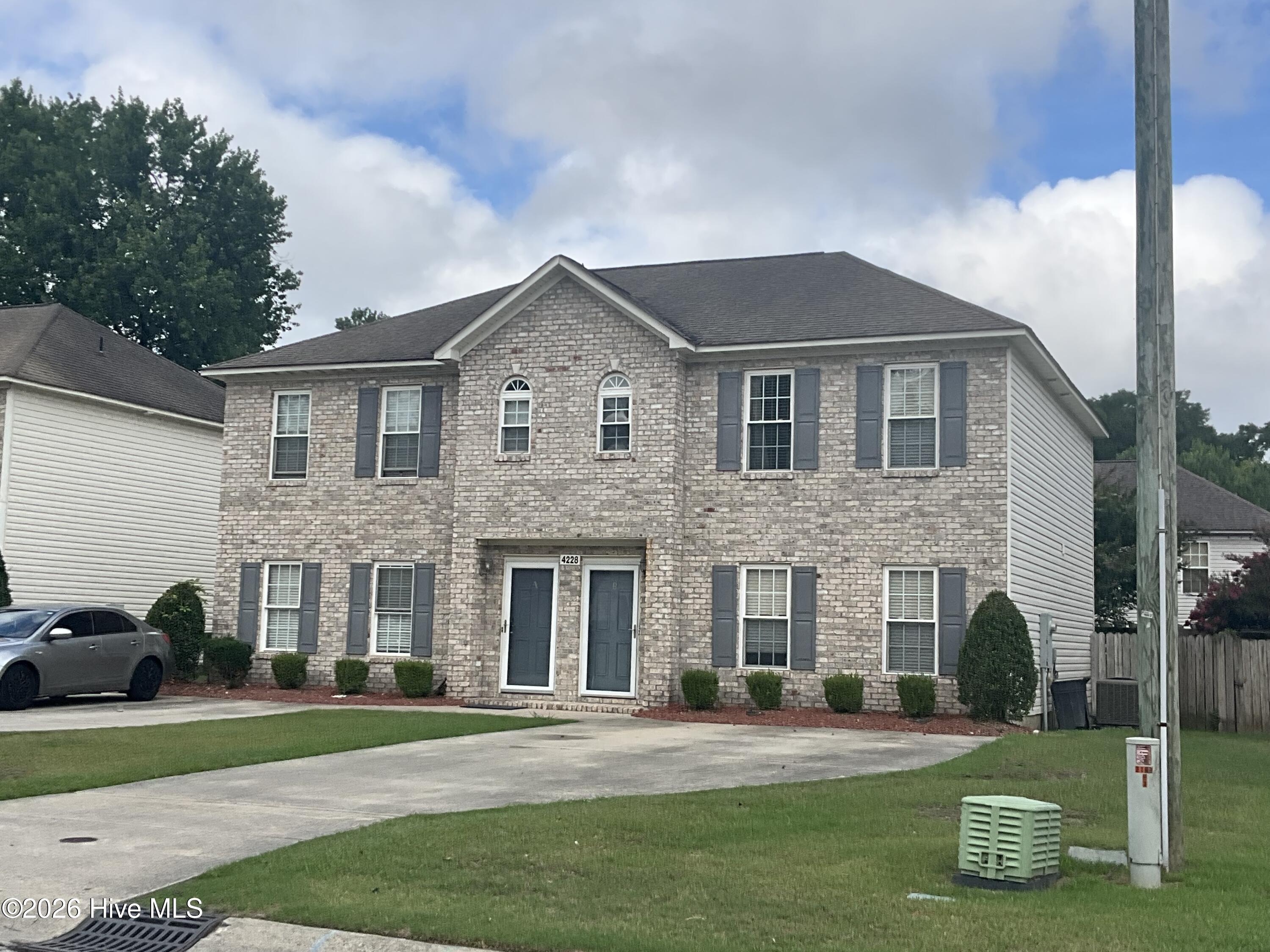 Exterior photo of 4228 Brook Creek Lane A, Greenville, NC 27858. MLS: 100587032