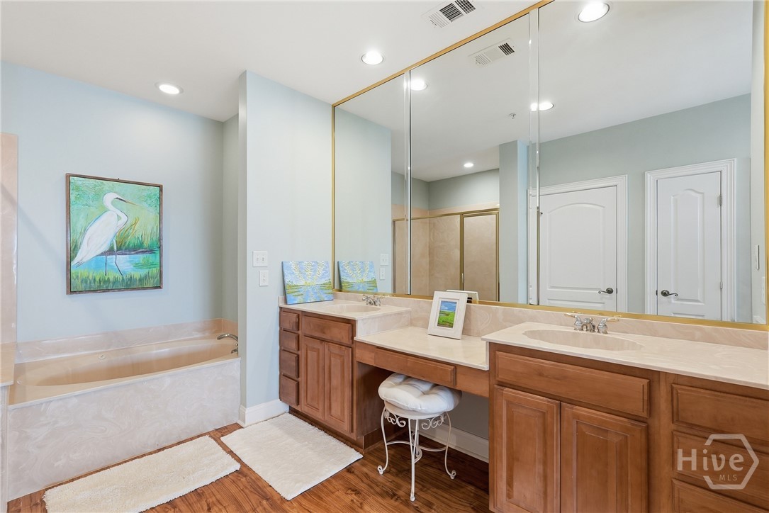 Double vanity sinks with separate garden tub in Pr