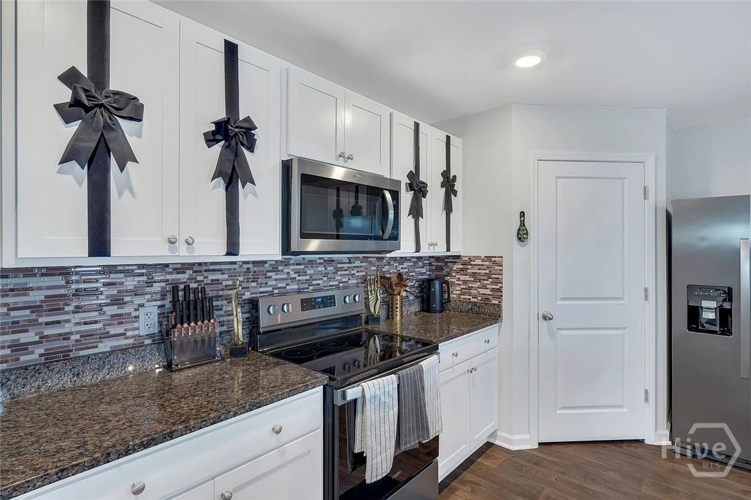 Kitchen with White Cabinets