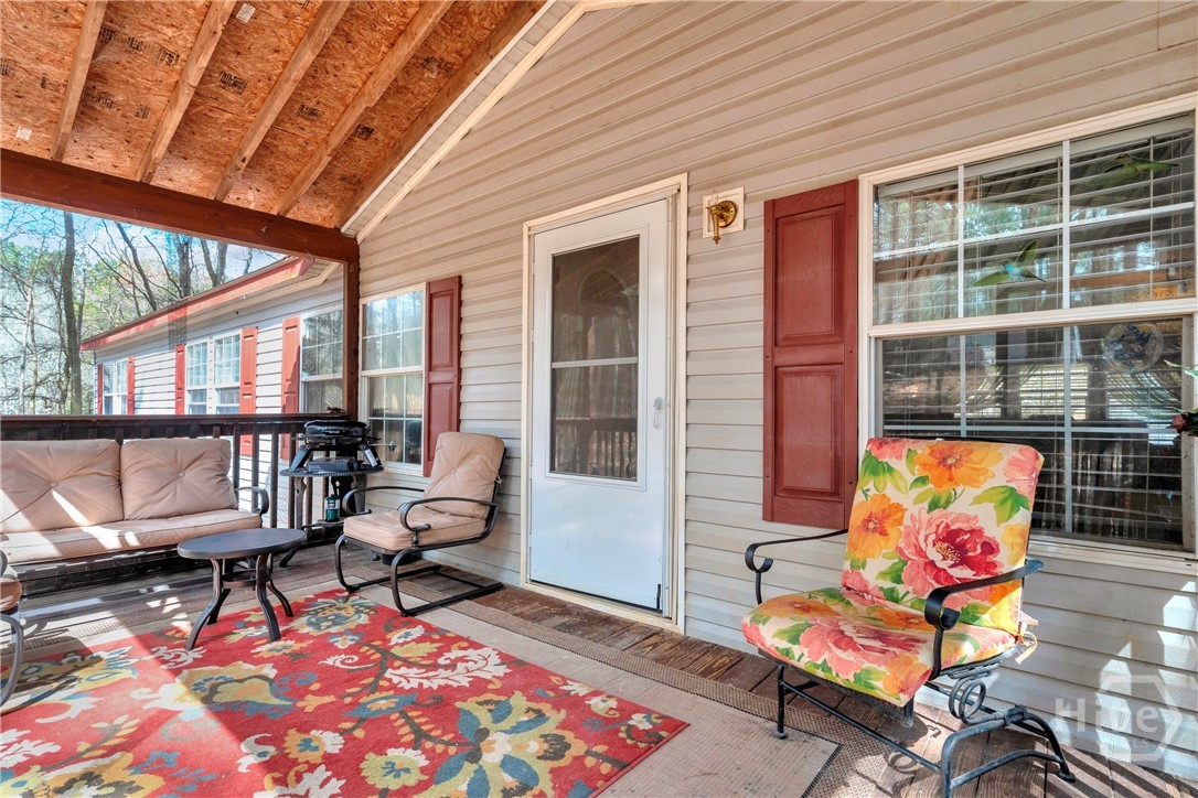 Covered, screened front porch