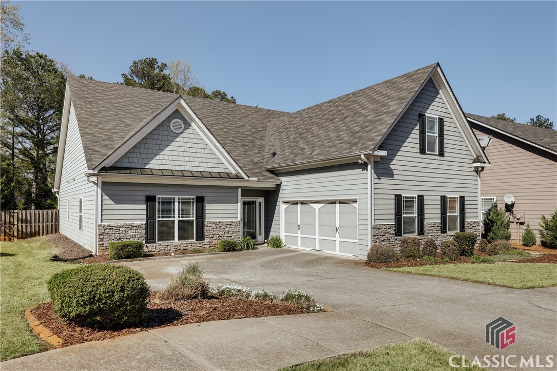 Welcome to your dream home nestled off the sought-after Timothy Road corridor! This enchanting 4-bedroom, 3.5-bath cottage combines comfort, elegance, and a touch of charm, making it perfect for families and entertaining alike.Step inside to discover the spacious main level featuring three well-appointed bedrooms and two and a half baths. The heart of the home is the vaulted great room, which effortlessly flows into a stylish study, both warmed by a stunning double-sided stone gas fireplace. The sunroom bathes the interior in natural light with its soaring ceilings, while the formal dining room showcases wood paneling, perfect for hosting memorable gatherings.The gourmet kitchen is a chef's delight, boasting an abundance of cabinetry, sleek Corian countertops, and a gas range. An inviting peninsula offers ample bar seating, complementing the cozy breakfast room. Enjoy the convenience of a large walk-in pantry, providing room for larger appliances and your favorite cooking essentials. A spacious laundry room with additional storage and utility sink adds to the home's practicality.Retreat to the luxurious owner's suite, featuring plush engineered flooring, double tray ceilings, and a generous walk-in closet that could easily accommodate extra dressers. The serene owner's bath is designed for relaxation, featuring a soaking tub, a large tile shower, dual vanities, and a separate lavatory for ultimate convenience.Venture outdoors to discover multiple entertaining spaces that are sure to impress. The highlight is the vaulted screen porch, perfect for enjoying summer evenings. Spacious decking flanks both sides of the screen porch, creating ideal spots for grilling and lounging. A beautifully accented stone patio awaits at the rear of the property, surrounded by lush landscaping and complemented by a charming stone planter.The fully fenced backyard ensures privacy and security. Complete with a two-car garage featuring a utility sink and level topography, this cottage is a true gem.Don’t miss your chance to own this exceptional home in a desirable location—schedule your private showing today! xx