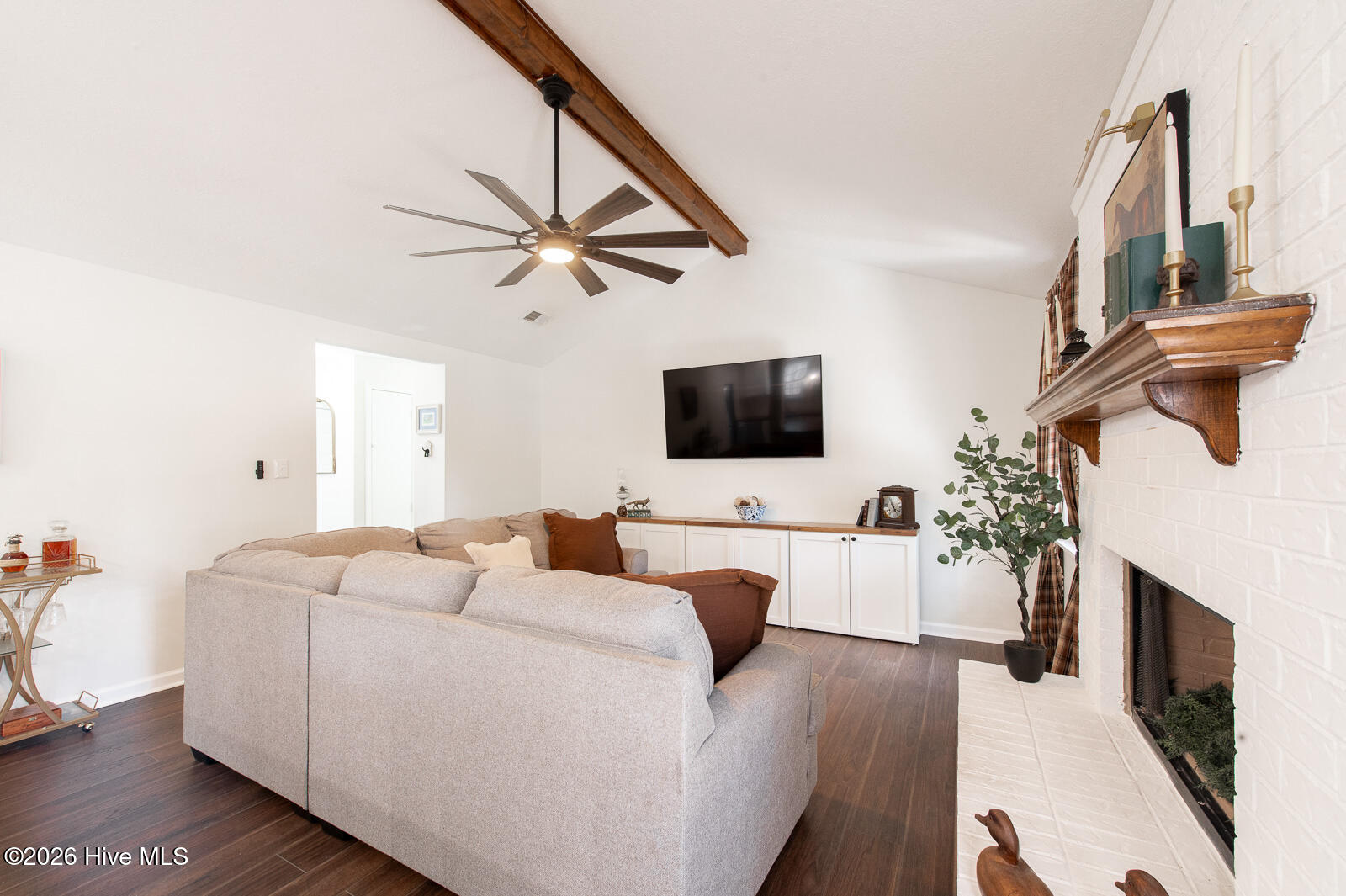 Vaulted Ceiling with Exposed Beam!