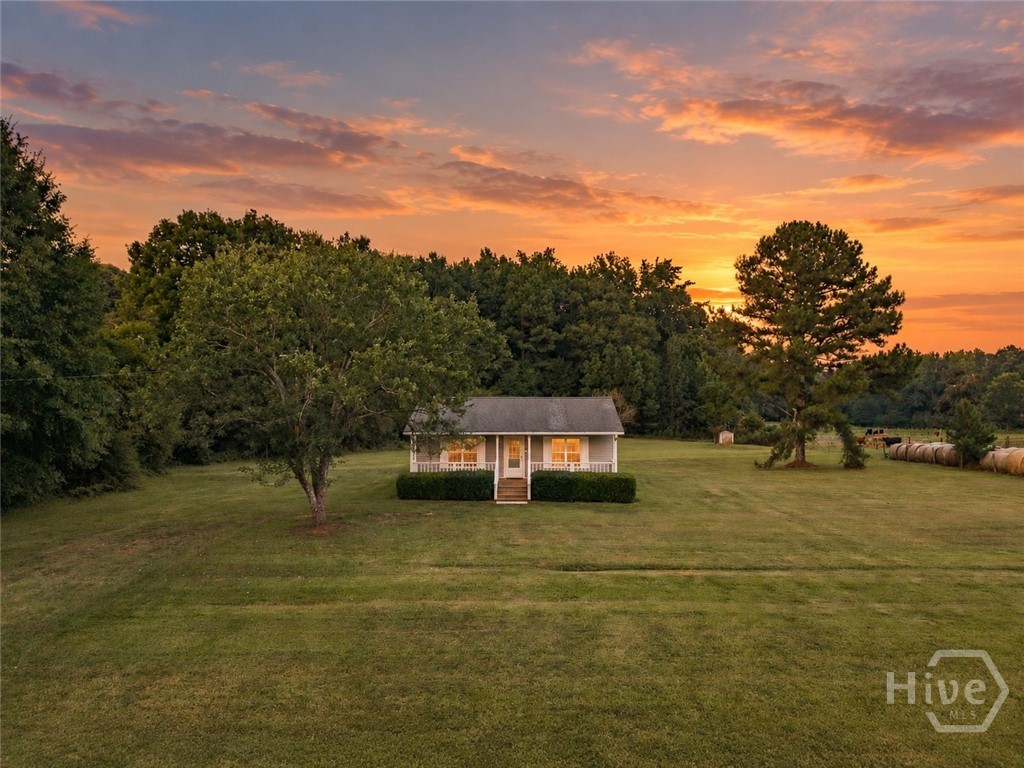 Wide-open spaces, pastoral views, and peaceful country living await at 984 Arnoldsville Road. Situated on approximately 1.5 acres just two miles from downtown Winterville, this charming 2 bedroom, 1 bathroom home offers the space and serenity of a rural retreat with convenient access to Athens. Start your mornings on the covered front porch, where neighboring cows may greet you from across the pasture. In the evenings, unwind or entertain on the private back deck overlooking the picturesque landscape. Inside, fresh interior paint and durable LVP flooring throughout create a bright, clean, and move-in ready interior. The open acreage provides plenty of room to garden, gather with friends, play, or simply slow down and enjoy the outdoors. Whether you are searching for a full-time residence, peaceful weekend retreat, or Athens area home with room to breathe, this property offers a refreshing sense of space without sacrificing everyday convenience. Downtown Winterville is only minutes away, placing beloved local attractions including the Marigold Festival, Pittard Park, the Firefly Trail, Little City Bread, and Farmstead Market within easy reach. With approximately 1.5 acres, scenic pasture views, inviting outdoor living spaces, and small-town charm, 984 Arnoldsville Road is a special opportunity to experience country living close to Winterville and Athens.