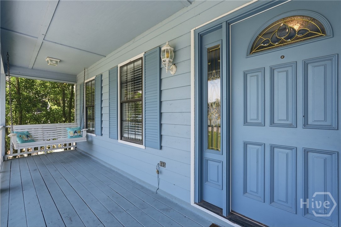 Enjoy relaxing on the porch swing with island breezes